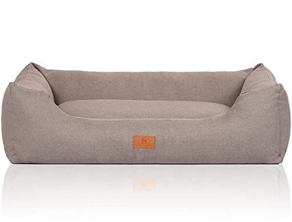 Découvrez le panier en velours Knuffelwuff Lotte, idéal pour offrir à votre chien un espace de repos confortable et stylé.